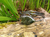 Black Silver twisted tendril bangle with blue green flash labradorite