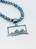 Textured silver mountain landscape pendant  on pearls