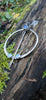 Hammered silver penannular pin with blue onyx and opalite