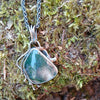 Antiqued sterling silver and moss agate seaweed pendant