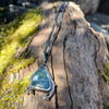 Antiqued sterling silver and moss agate seaweed pendant