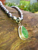 green seaglass pendant on pearls