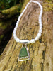 green seaglass pendant on pearls