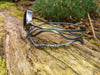 Black Silver twisted tendril bangle with blue green flash labradorite