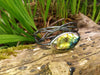 Black Silver twisted tendril bangle with blue green flash labradorite
