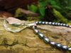 Raw Rose Quartz Pendant on black pearls