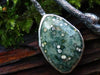 Seaweed pod necklace close up of stone