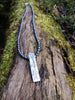sterling silver pendant on slim black freshwater pearls