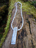 sterling silver pendant on slim white freshwater pearls