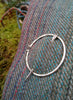  Small sterling silver penannular pin