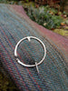  Small sterling silver penannular pin