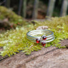 Sterling silver and Garnet set of 3 tiny stackers on a mossy log