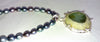 Handmade silver pendant on pearls