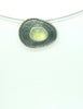 Black silver and prehnite pendant