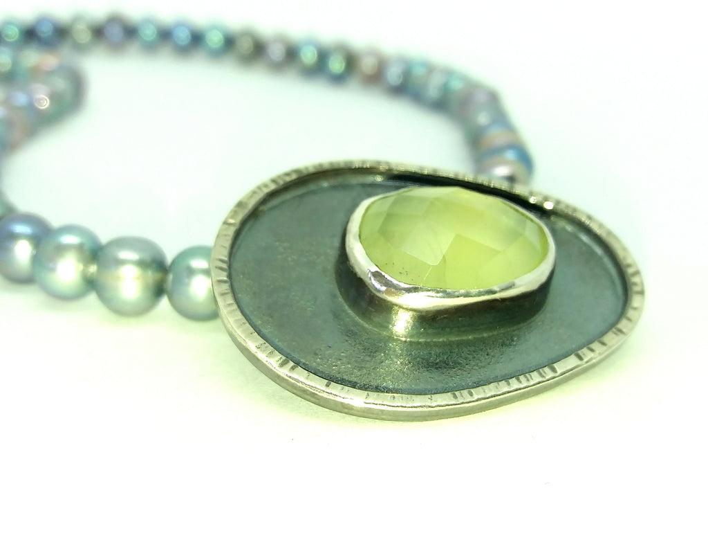 Silver and prehnite pendant on pearls