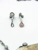 Pink and green mismatch stud earrings