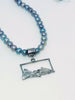 Sterling silver landscape pendant on pearls