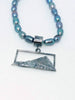 Landscape pendant on pearls