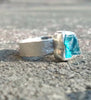 Textured silver ring with blue apatite