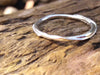 tiny wound silver stacking ring