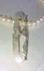 Sterling silver textured pendant on pearls