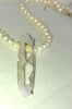 Sterling silver textured pendant on pearls